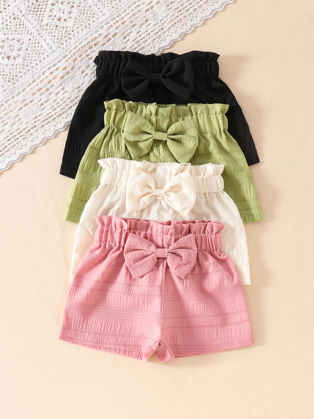 4pcs Girls' Casual Solid Color Polyester Shorts with 3D Bow Detail, Regular Fit Woven Fabric for Spring/Summer - 95% Polyester,